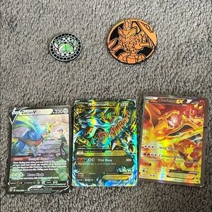 Pokemon Trading Cards - Multicolor Charizard and Zacian V